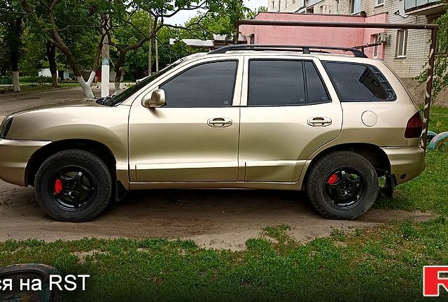Жовтий Хендай Санта Фе, об'ємом двигуна 2.4 л та пробігом 400 тис. км за 6500 $, фото 2 на Automoto.ua