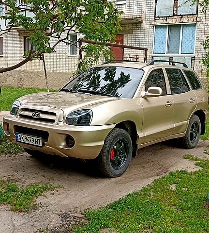 Жовтий Хендай Санта Фе, об'ємом двигуна 2.4 л та пробігом 400 тис. км за 6500 $, фото 4 на Automoto.ua
