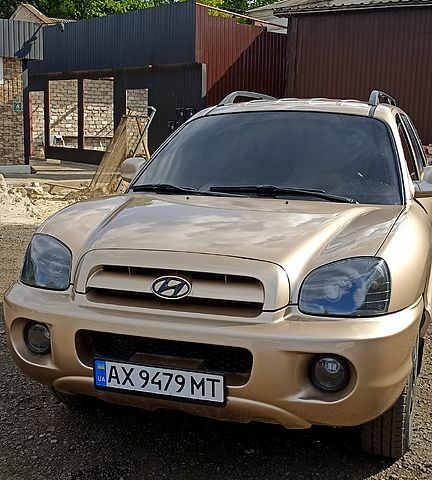 Жовтий Хендай Санта Фе, об'ємом двигуна 2.4 л та пробігом 400 тис. км за 6500 $, фото 1 на Automoto.ua