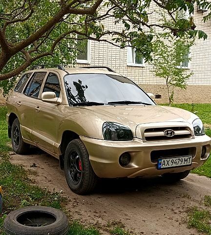 Жовтий Хендай Санта Фе, об'ємом двигуна 2.4 л та пробігом 400 тис. км за 6500 $, фото 3 на Automoto.ua