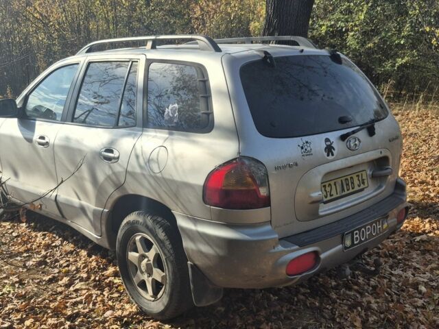 Серый Хендай Санта Фе, объемом двигателя 2 л и пробегом 260 тыс. км за 3597 $, фото 2 на Automoto.ua