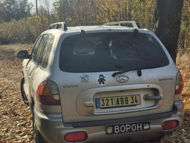 Серый Хендай Санта Фе, объемом двигателя 2 л и пробегом 260 тыс. км за 3597 $, фото 1 на Automoto.ua