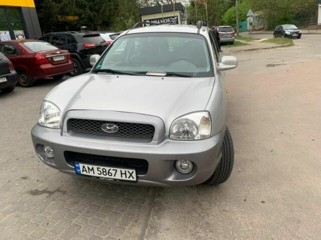 Серый Хендай Санта Фе, объемом двигателя 2.4 л и пробегом 140 тыс. км за 3200 $, фото 2 на Automoto.ua