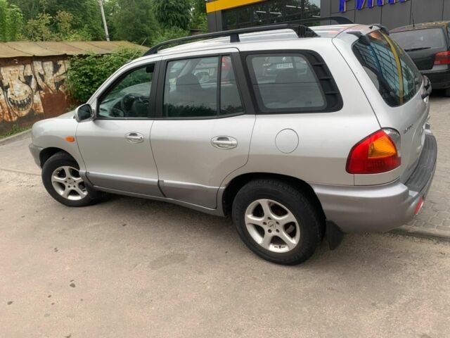 Серый Хендай Санта Фе, объемом двигателя 2.4 л и пробегом 140 тыс. км за 3200 $, фото 1 на Automoto.ua