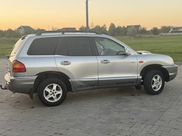 Серый Хендай Санта Фе, объемом двигателя 2 л и пробегом 300 тыс. км за 2999 $, фото 2 на Automoto.ua