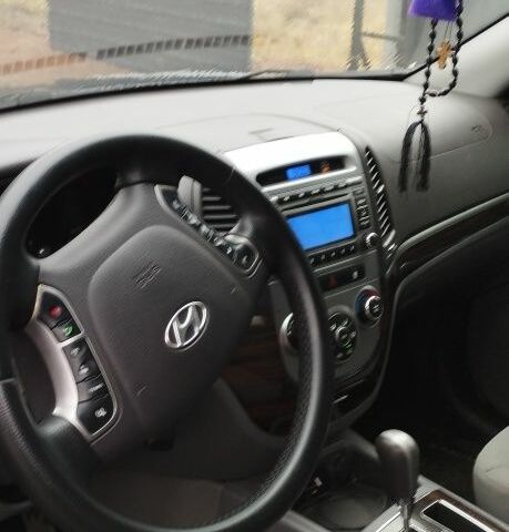 Серый Хендай Санта Фе, объемом двигателя 2.4 л и пробегом 260 тыс. км за 11500 $, фото 12 на Automoto.ua