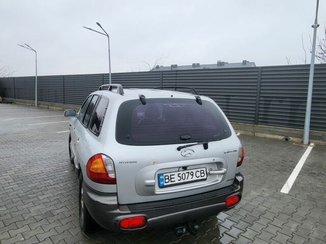 Серый Хендай Санта Фе, объемом двигателя 2.7 л и пробегом 327 тыс. км за 4000 $, фото 7 на Automoto.ua