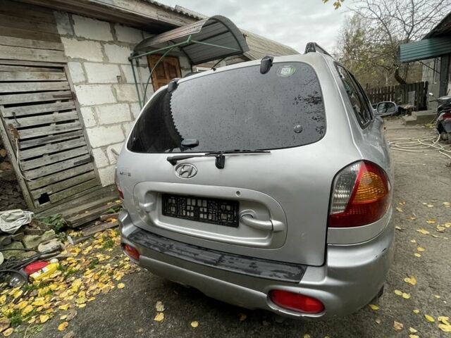 Серый Хендай Санта Фе, объемом двигателя 2 л и пробегом 272 тыс. км за 2800 $, фото 2 на Automoto.ua