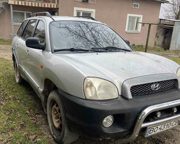 Серый Хендай Санта Фе, объемом двигателя 2.4 л и пробегом 250 тыс. км за 5000 $, фото 4 на Automoto.ua