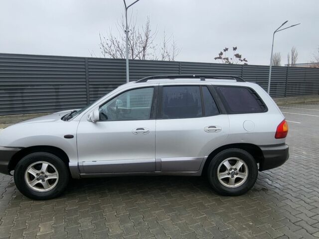 Серый Хендай Санта Фе, объемом двигателя 2.7 л и пробегом 327 тыс. км за 4000 $, фото 2 на Automoto.ua