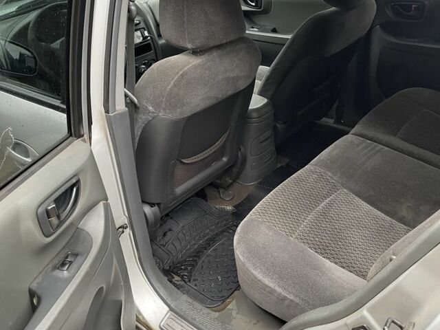 Серый Хендай Санта Фе, объемом двигателя 2 л и пробегом 272 тыс. км за 2800 $, фото 6 на Automoto.ua