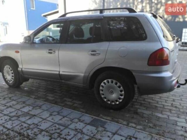 Серый Хендай Санта Фе, объемом двигателя 2 л и пробегом 312 тыс. км за 6000 $, фото 3 на Automoto.ua