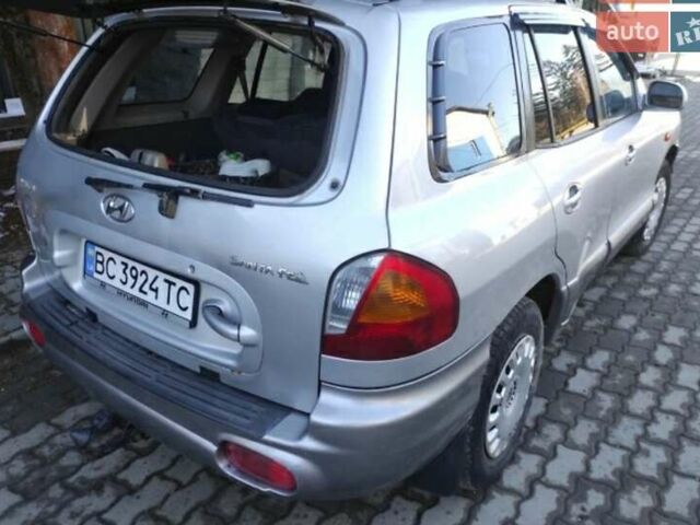 Серый Хендай Санта Фе, объемом двигателя 2 л и пробегом 312 тыс. км за 6000 $, фото 4 на Automoto.ua