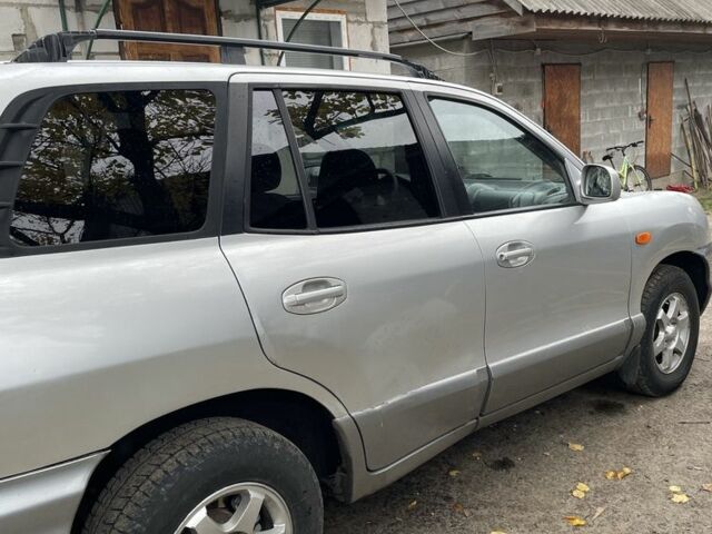 Серый Хендай Санта Фе, объемом двигателя 2 л и пробегом 272 тыс. км за 2800 $, фото 1 на Automoto.ua
