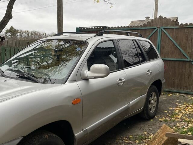 Серый Хендай Санта Фе, объемом двигателя 2 л и пробегом 272 тыс. км за 2800 $, фото 7 на Automoto.ua