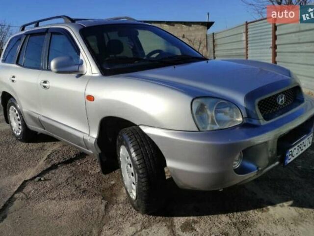 Серый Хендай Санта Фе, объемом двигателя 2 л и пробегом 312 тыс. км за 6000 $, фото 1 на Automoto.ua