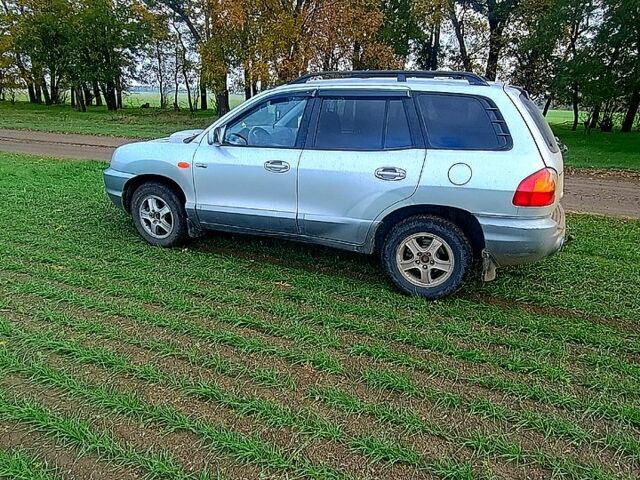 Серый Хендай Санта Фе, объемом двигателя 2 л и пробегом 262 тыс. км за 5200 $, фото 6 на Automoto.ua