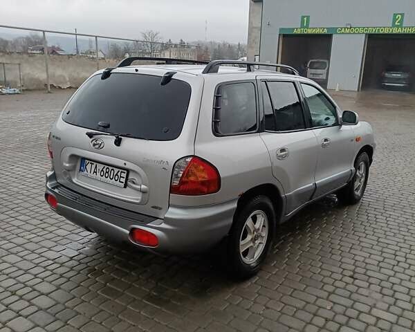 Серый Хендай Санта Фе, объемом двигателя 1.99 л и пробегом 350 тыс. км за 4200 $, фото 3 на Automoto.ua