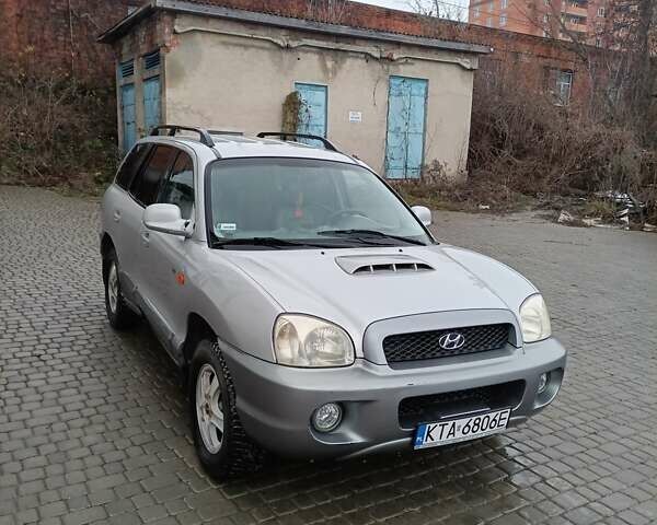 Серый Хендай Санта Фе, объемом двигателя 1.99 л и пробегом 350 тыс. км за 4200 $, фото 1 на Automoto.ua