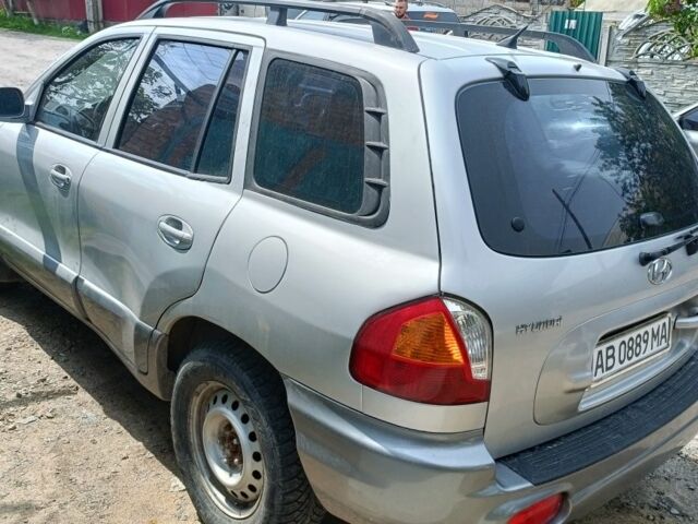 Серый Хендай Санта Фе, объемом двигателя 2.4 л и пробегом 235 тыс. км за 5100 $, фото 2 на Automoto.ua