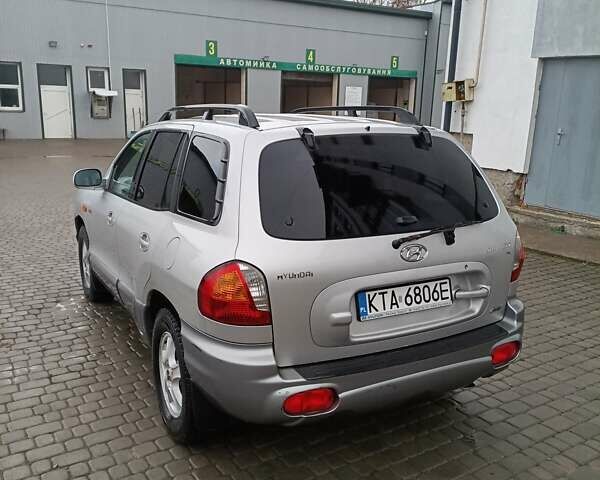 Серый Хендай Санта Фе, объемом двигателя 1.99 л и пробегом 350 тыс. км за 4200 $, фото 4 на Automoto.ua