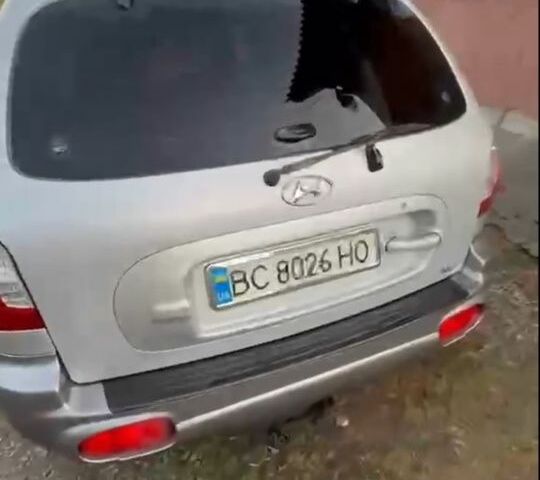 Серый Хендай Санта Фе, объемом двигателя 2 л и пробегом 270 тыс. км за 6000 $, фото 4 на Automoto.ua