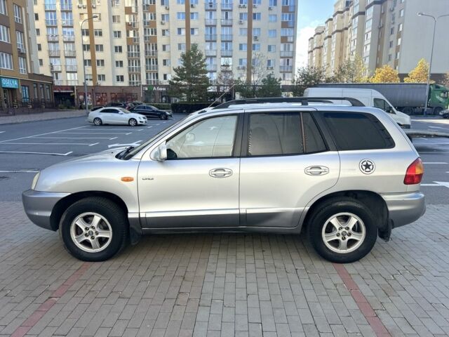 Серый Хендай Санта Фе, объемом двигателя 2 л и пробегом 357 тыс. км за 3700 $, фото 5 на Automoto.ua