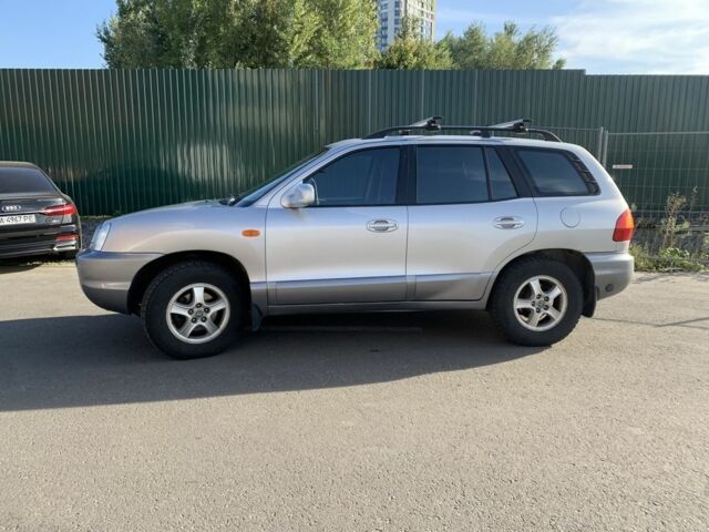 Серый Хендай Санта Фе, объемом двигателя 2.7 л и пробегом 270 тыс. км за 4800 $, фото 1 на Automoto.ua