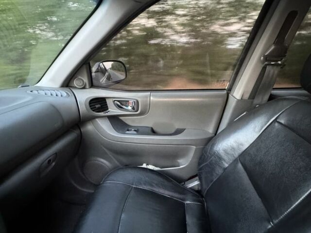 Хендай Санта Фе 2003 в Николаеве на Automoto.ua Серый Хендай Санта Фе, объемом двигателя 2 л и пробегом 366 тыс. км за 5900 $, фото 4 на Automoto.ua