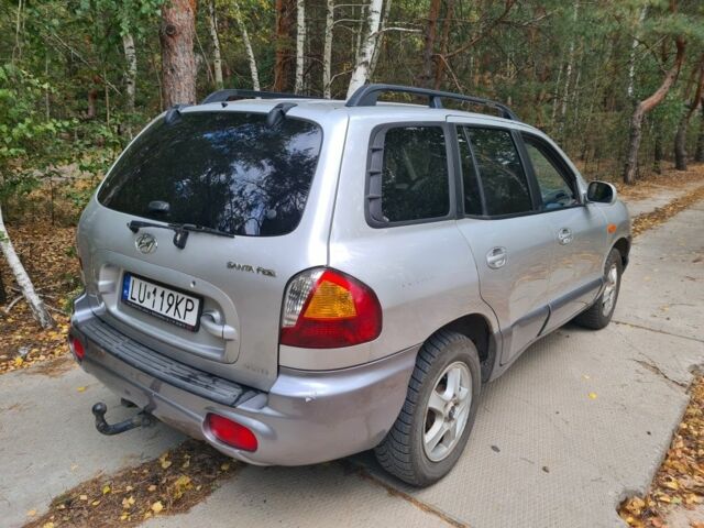 Серый Хендай Санта Фе, объемом двигателя 2 л и пробегом 315 тыс. км за 4000 $, фото 3 на Automoto.ua