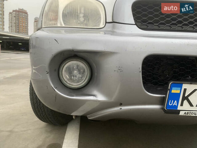 Серый Хендай Санта Фе, объемом двигателя 2.4 л и пробегом 115 тыс. км за 6100 $, фото 16 на Automoto.ua