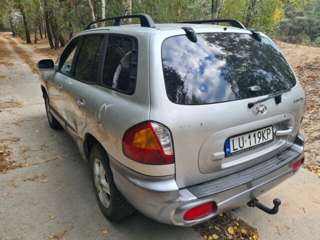 Серый Хендай Санта Фе, объемом двигателя 2 л и пробегом 315 тыс. км за 4000 $, фото 4 на Automoto.ua