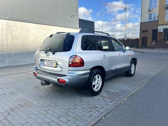 Серый Хендай Санта Фе, объемом двигателя 2 л и пробегом 357 тыс. км за 3700 $, фото 2 на Automoto.ua