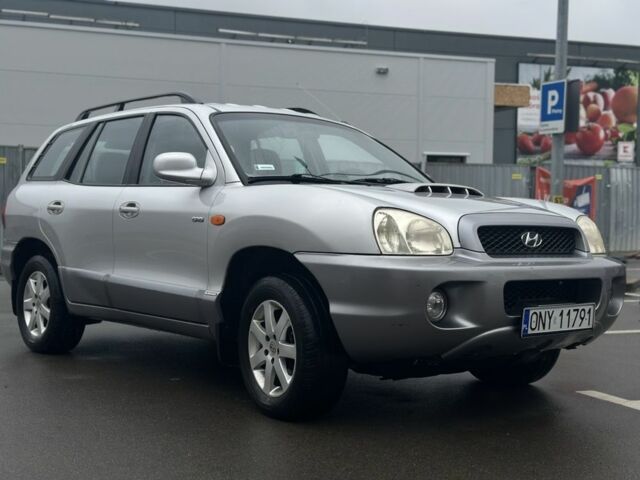 Серый Хендай Санта Фе, объемом двигателя 2 л и пробегом 241 тыс. км за 3159 $, фото 1 на Automoto.ua