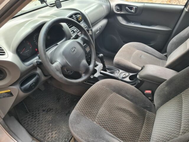 Серый Хендай Санта Фе, объемом двигателя 2 л и пробегом 315 тыс. км за 4000 $, фото 5 на Automoto.ua