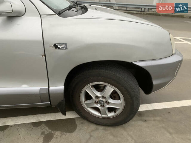 Серый Хендай Санта Фе, объемом двигателя 2.4 л и пробегом 115 тыс. км за 6100 $, фото 11 на Automoto.ua