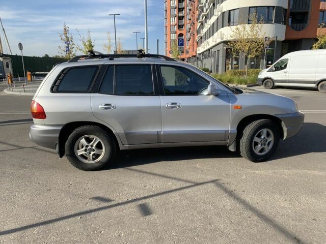 Серый Хендай Санта Фе, объемом двигателя 2.7 л и пробегом 270 тыс. км за 4800 $, фото 4 на Automoto.ua