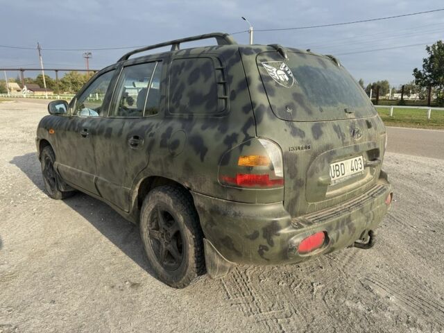 Серый Хендай Санта Фе, объемом двигателя 2.4 л и пробегом 300 тыс. км за 2200 $, фото 4 на Automoto.ua