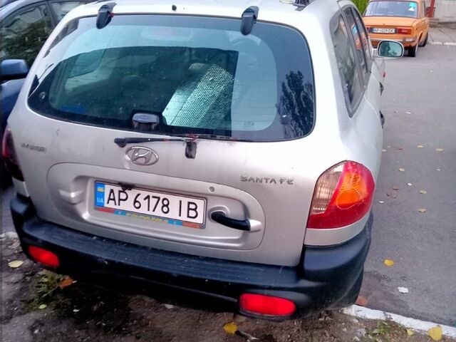 Серый Хендай Санта Фе, объемом двигателя 2 л и пробегом 280 тыс. км за 2500 $, фото 3 на Automoto.ua