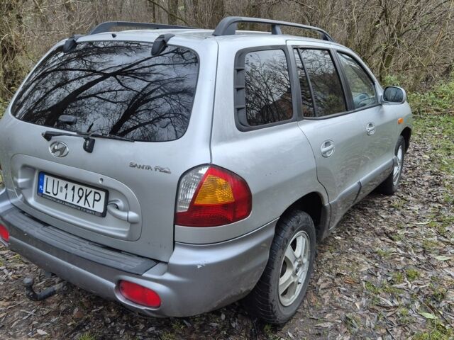 Серый Хендай Санта Фе, объемом двигателя 2 л и пробегом 316 тыс. км за 3801 $, фото 3 на Automoto.ua