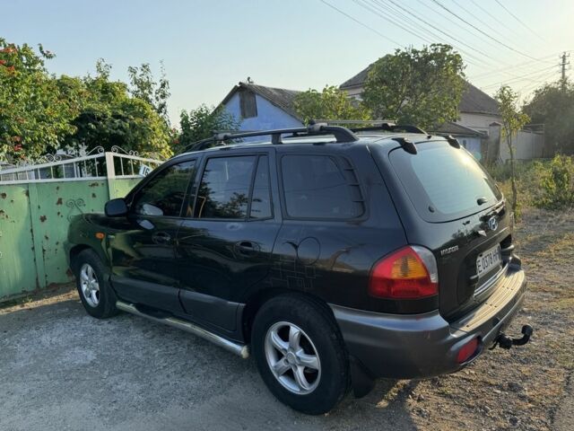 Хендай Санта Фе 2003 в Николаеве на Automoto.ua Серый Хендай Санта Фе, объемом двигателя 2 л и пробегом 366 тыс. км за 5900 $, фото 7 на Automoto.ua