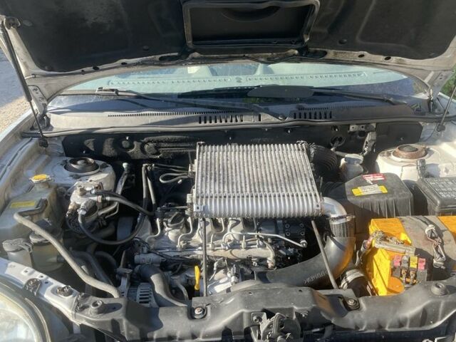 Сірий Хендай Санта Фе, об'ємом двигуна 2 л та пробігом 260 тис. км за 3313 $, фото 4 на Automoto.ua