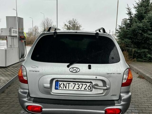 Сірий Хендай Санта Фе, об'ємом двигуна 2 л та пробігом 370 тис. км за 3650 $, фото 5 на Automoto.ua