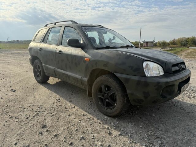 Серый Хендай Санта Фе, объемом двигателя 2.4 л и пробегом 300 тыс. км за 2200 $, фото 2 на Automoto.ua