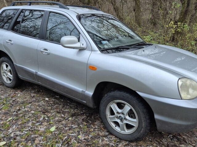 Серый Хендай Санта Фе, объемом двигателя 2 л и пробегом 316 тыс. км за 3801 $, фото 4 на Automoto.ua