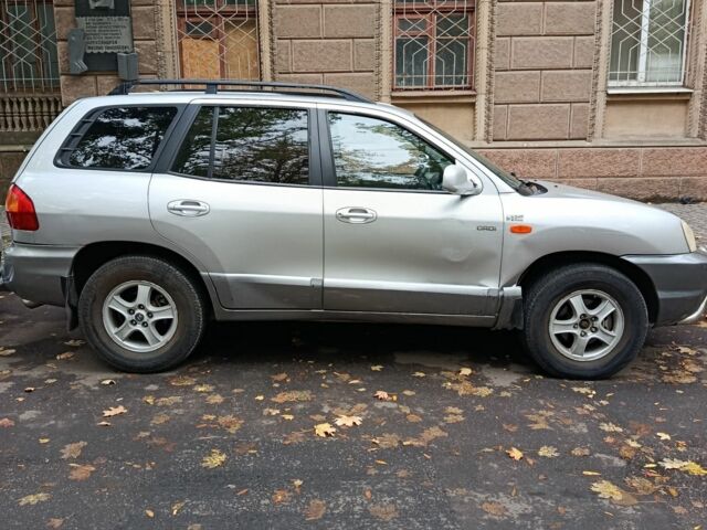 Хендай Санта Фе 2003 в Николаеве на Automoto.ua Серый Хендай Санта Фе, объемом двигателя 2 л и пробегом 343 тыс. км за 5500 $, фото 1 на Automoto.ua