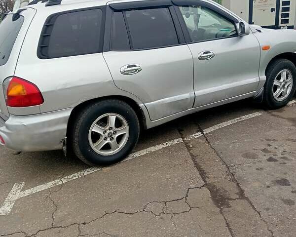 Сірий Хендай Санта Фе, об'ємом двигуна 1.99 л та пробігом 320 тис. км за 5500 $, фото 3 на Automoto.ua