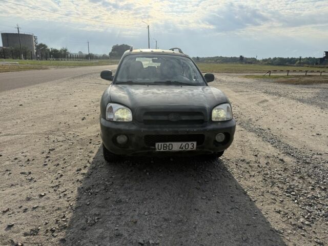 Серый Хендай Санта Фе, объемом двигателя 2.4 л и пробегом 300 тыс. км за 2200 $, фото 1 на Automoto.ua