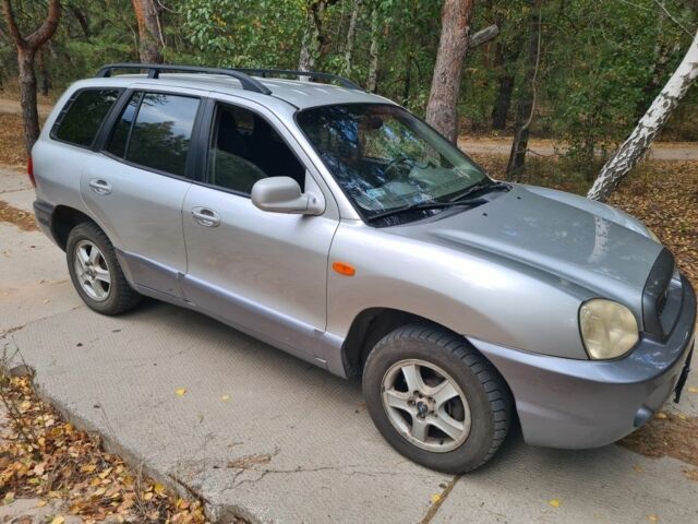 Серый Хендай Санта Фе, объемом двигателя 2 л и пробегом 315 тыс. км за 4000 $, фото 2 на Automoto.ua