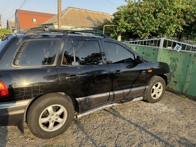 Хендай Санта Фе 2003 в Николаеве на Automoto.ua Серый Хендай Санта Фе, объемом двигателя 2 л и пробегом 366 тыс. км за 5900 $, фото 2 на Automoto.ua